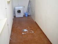 Utility Area / Rear Patio Area